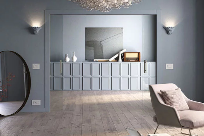 How to save on making a frameless glass pocket door slide smoothly